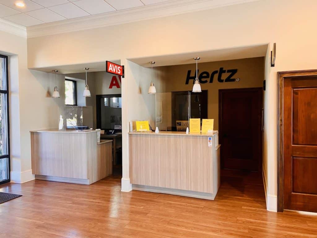 Hertz and Avis rental booths at Golden Isles Aviation at St Simons Island Airport